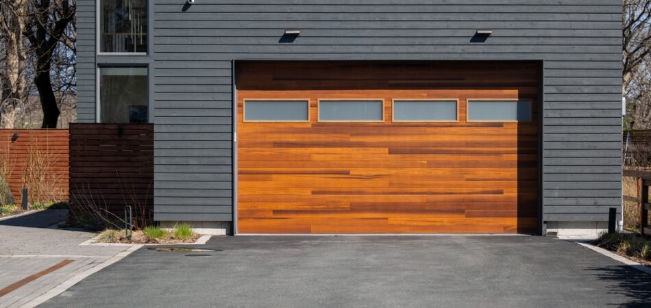 A,modern,brown,faux,wooden,exterior,garage,door,with,four