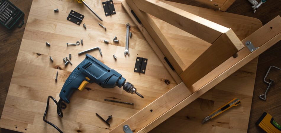 Top,view,of,drill,tool,and,another,equipment,on,wood