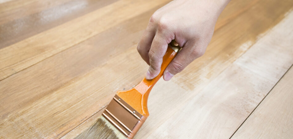 Applying,protective,varnish,on,a,wooden,furniture