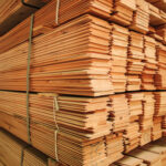 Wooden,bars,stacked,in,the,warehouse,of,a,lumber,company