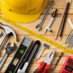 All,tools,supplies,home,construction,on,the,wooden,table,background.